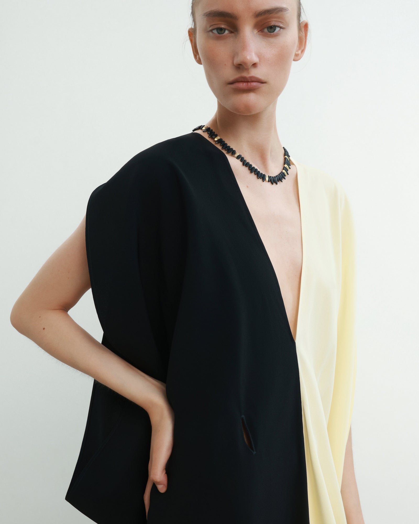 Model wearing the BEVZA sunflower necklace