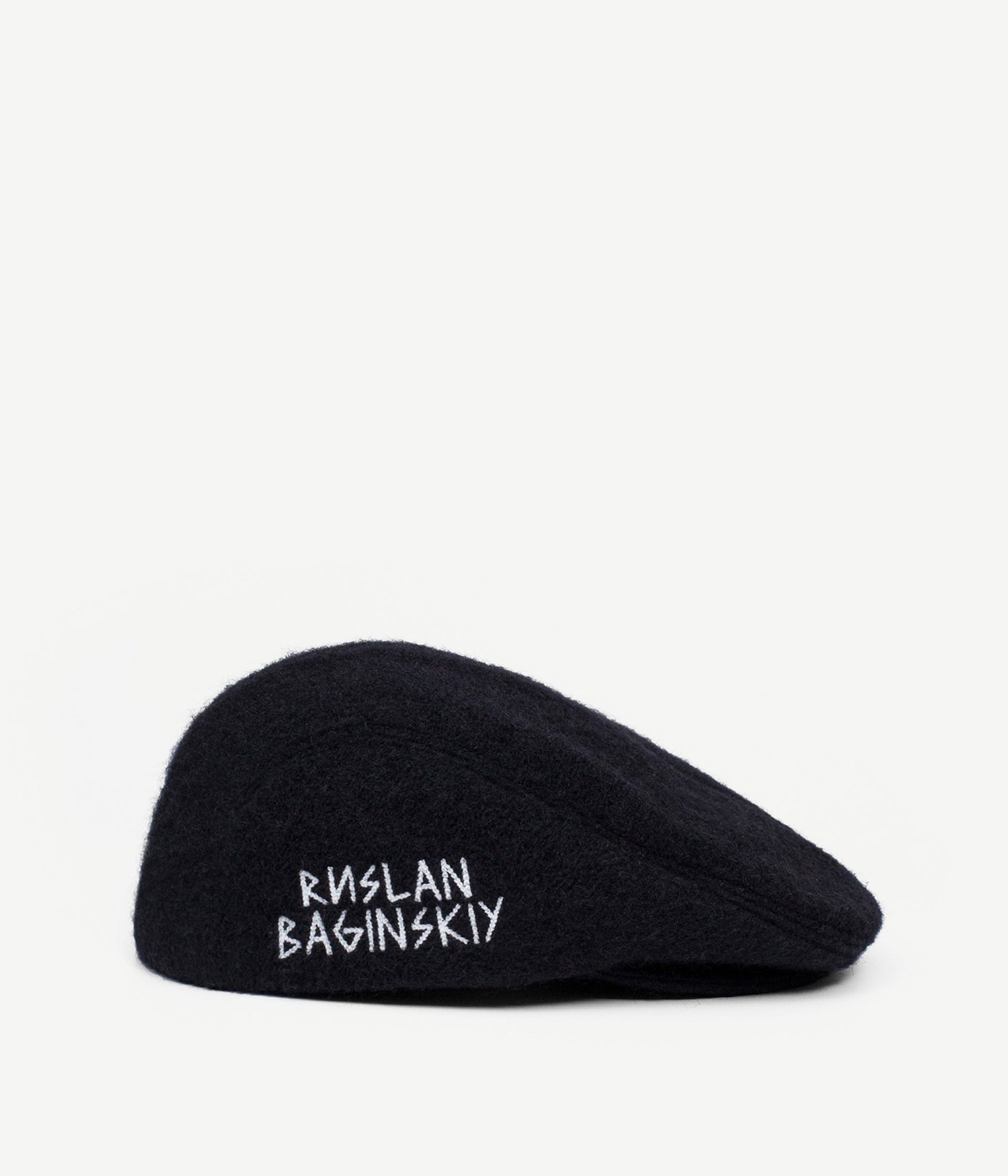 Black wool ivy cap with embroidered Ruslan Baginskiy lettering